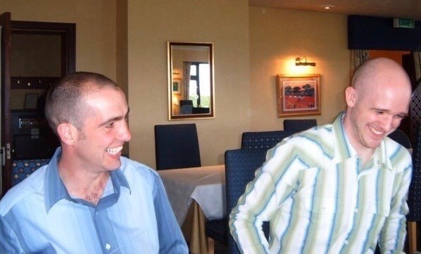 Alan Hyslop and his brother in law Scott, both laughing.
